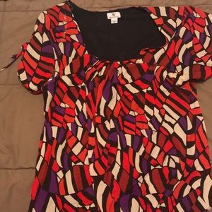 Geometric design with cap sleeve blouse